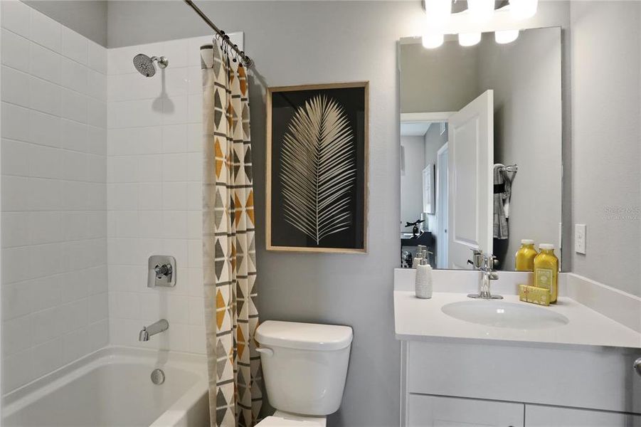 Furnished interior view inside a new home in Serenade at Ovation, Winter Garden (Image 17).