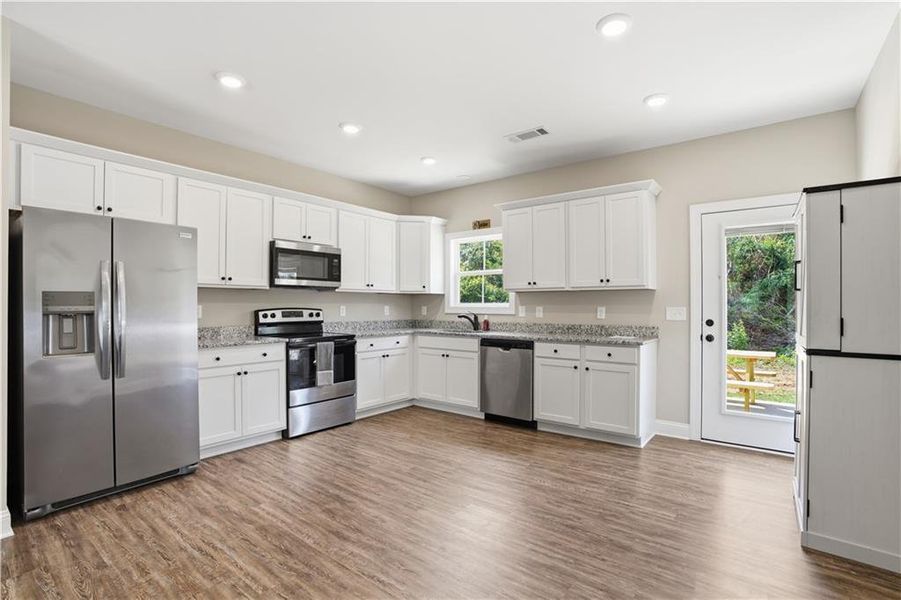 Furnished interior view inside a new home in , Kingston (Image 9).