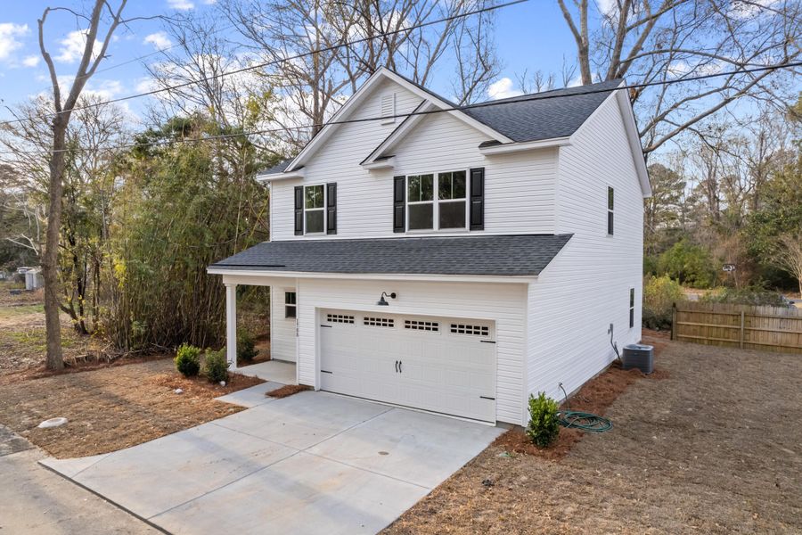 Front exterior of a new home in , Charleston, SC, highlighting curb appeal (Image 25). Front exterior of a new home in , Charleston, SC, highlighting curb appeal (Image 25).