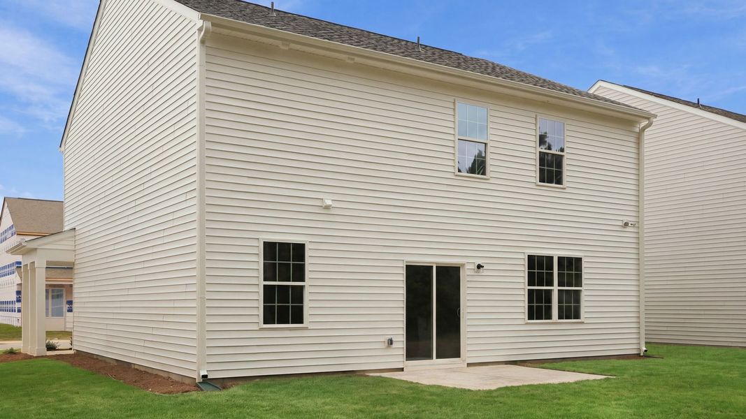 Exterior details and patio area of a home in Ridgewood Farms, Winterville (Image 16).
