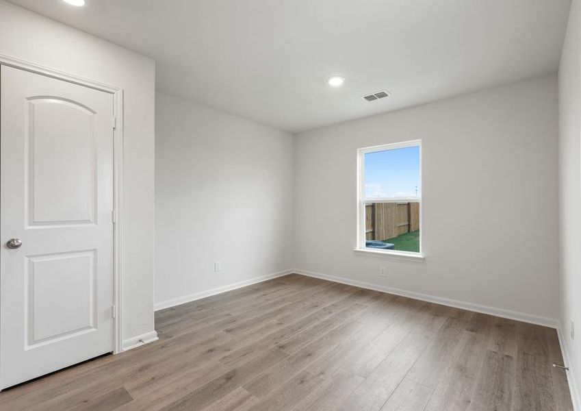 The dining room has a large window that lets in great natural light.