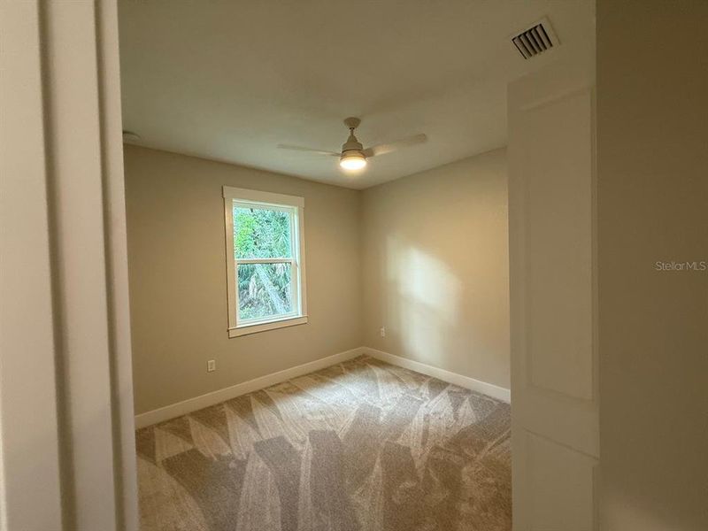 Spacious, unfurnished interior of a new home in , Port Charlotte (Image 9).