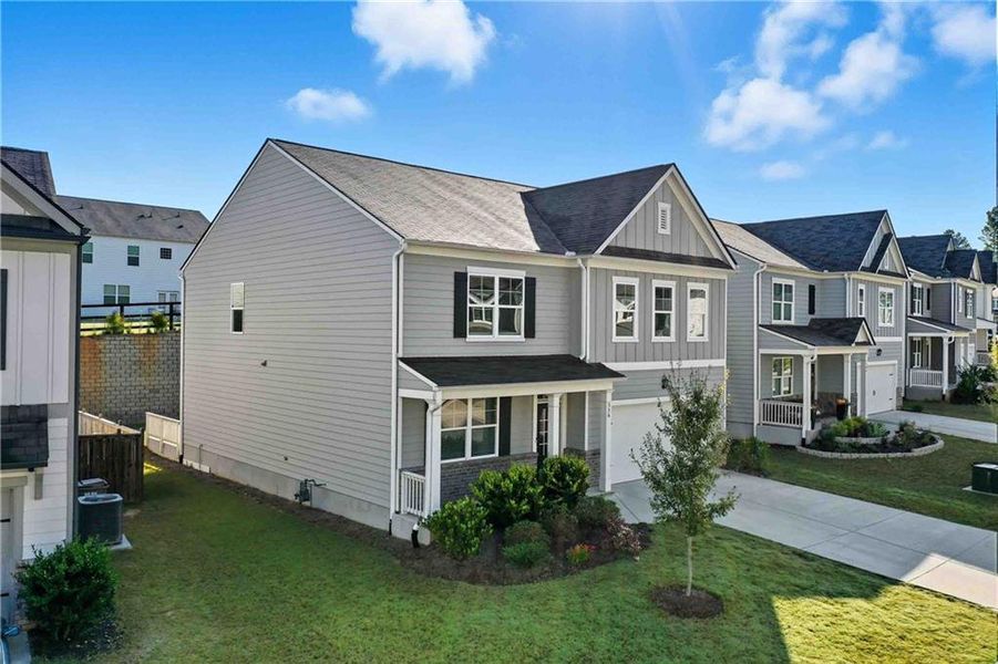 Front exterior of a new home in , Dawsonville, GA, highlighting curb appeal (Image 2).