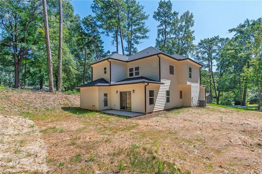 Front exterior of a new home in , Decatur, GA, highlighting curb appeal (Image 1).