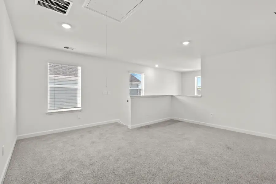 Spacious, unfurnished interior of a new home in Waterside - Boardwalk Series, Longs (Image 9).