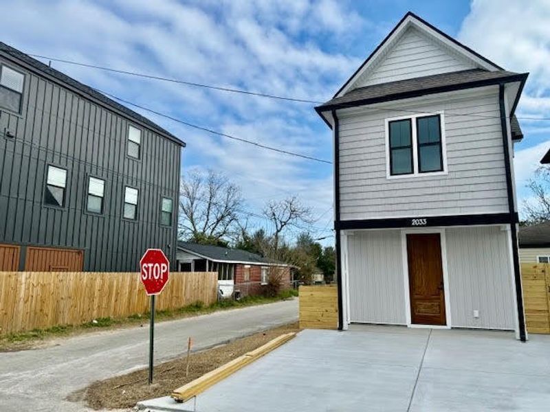 Front exterior of a new home in , North Charleston, SC, highlighting curb appeal (Image 18).