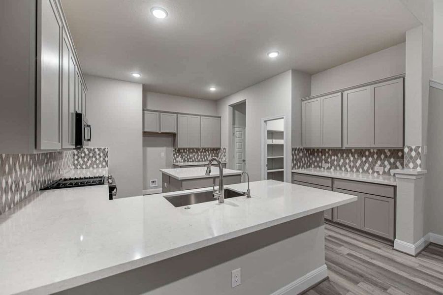 Representative furnished interior of a home built from the Shenandoah by Chesmar Homes in Berry Creek Highlands, Georgetown (Image 5).