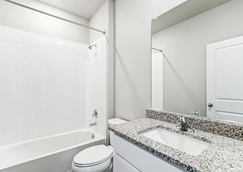 The secondary bathroom has a tub/shower combo.