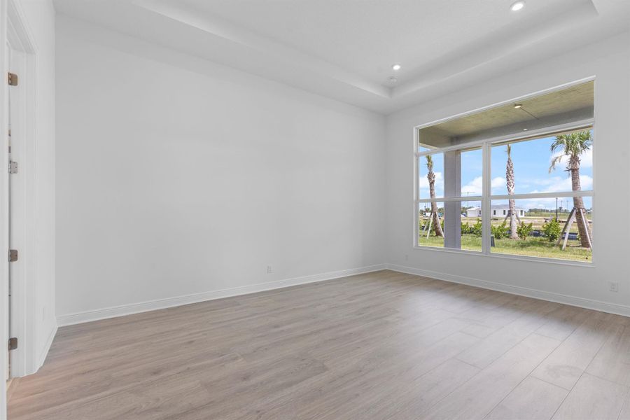 Furnished interior view inside a new home in PGA Village Verano, Port St. Lucie (Image 10).