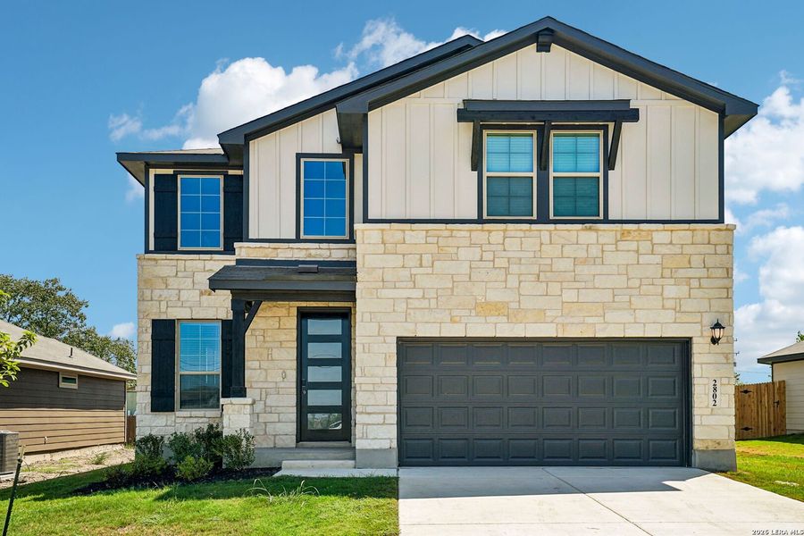 Front exterior of a new home in Catalina, Converse, TX, highlighting curb appeal (Image 25).