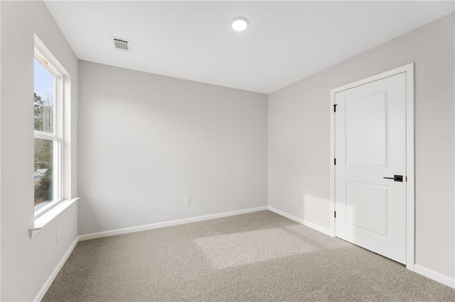 Spacious, unfurnished interior of a new home in The Bluffs, Canton (Image 16). Spacious, unfurnished interior of a new home in The Bluffs, Canton (Image 16).