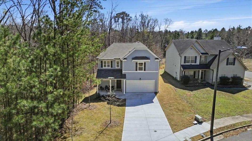 Front exterior of a new home in Tell River, Atlanta, GA, highlighting curb appeal (Image 24). Front exterior of a new home in Tell River, Atlanta, GA, highlighting curb appeal (Image 24).