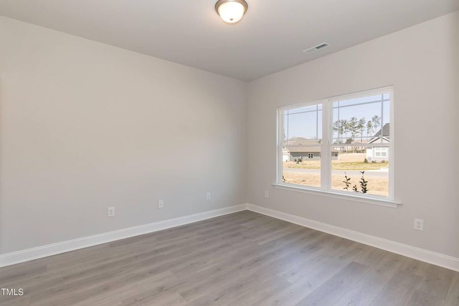 Representative unfurnished interior of a home built from the 2721 by Adams Homes in Hidden Pines, Cameron (Image 13).