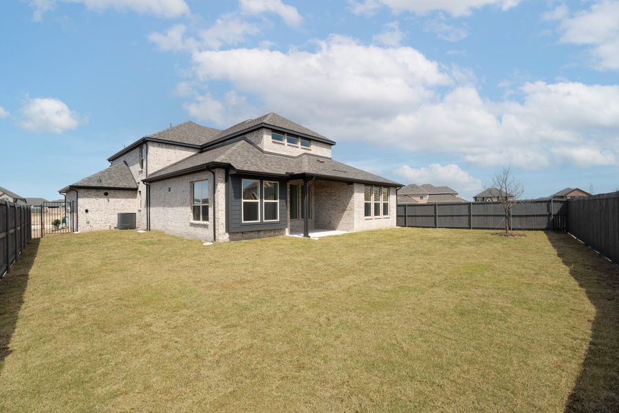 Exterior details and patio area of a home in Goodland, Midlothian (Image 2).