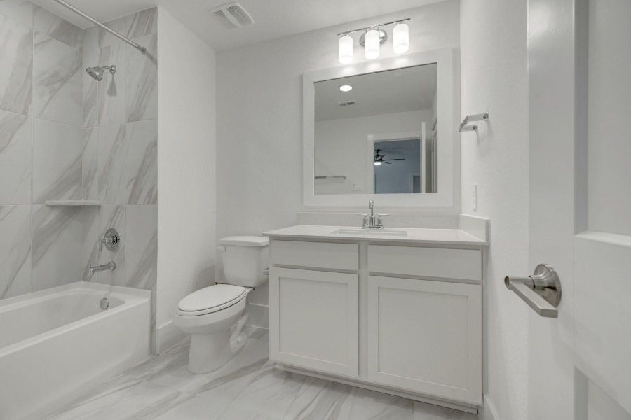 Furnished interior view inside a new home in The Oaks on 6th Street, Magnolia (Image 33). Furnished interior view inside a new home in The Oaks on 6th Street, Magnolia (Image 33).