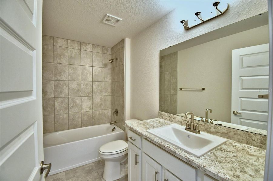 Furnished interior view inside a new home in Cadence Crossing, Auburndale (Image 9). Furnished interior view inside a new home in Cadence Crossing, Auburndale (Image 9).