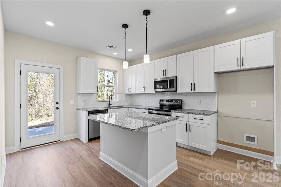 Furnished interior view inside a new home in , Hickory (Image 7).