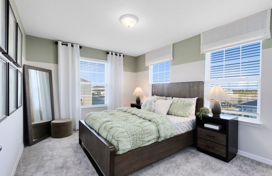 Representative furnished interior of a home built from the Mabel II by Pulte Homes in EverBe, Orlando (Image 19).