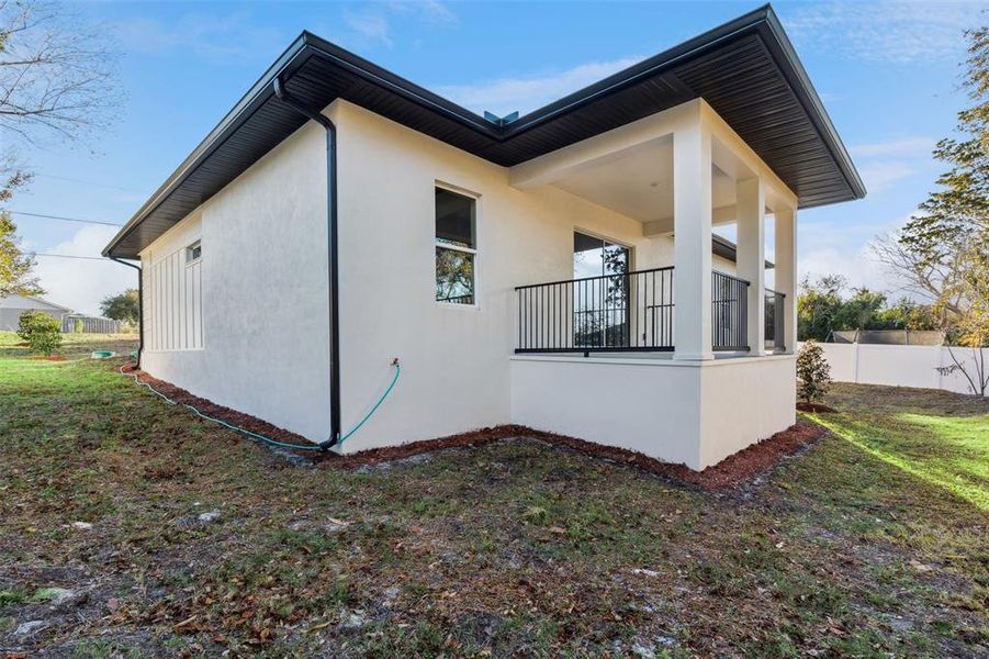 Exterior details and patio area of a home in , Deltona (Image 19).