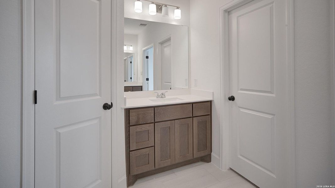 Furnished interior view inside a new home in Ladera, San Antonio (Image 10).