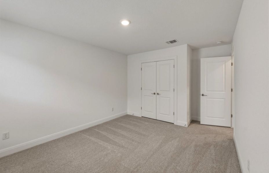 Spacious, unfurnished interior of a new home in Saddleback at Santa Rita Ranch, Liberty Hill (Image 35).