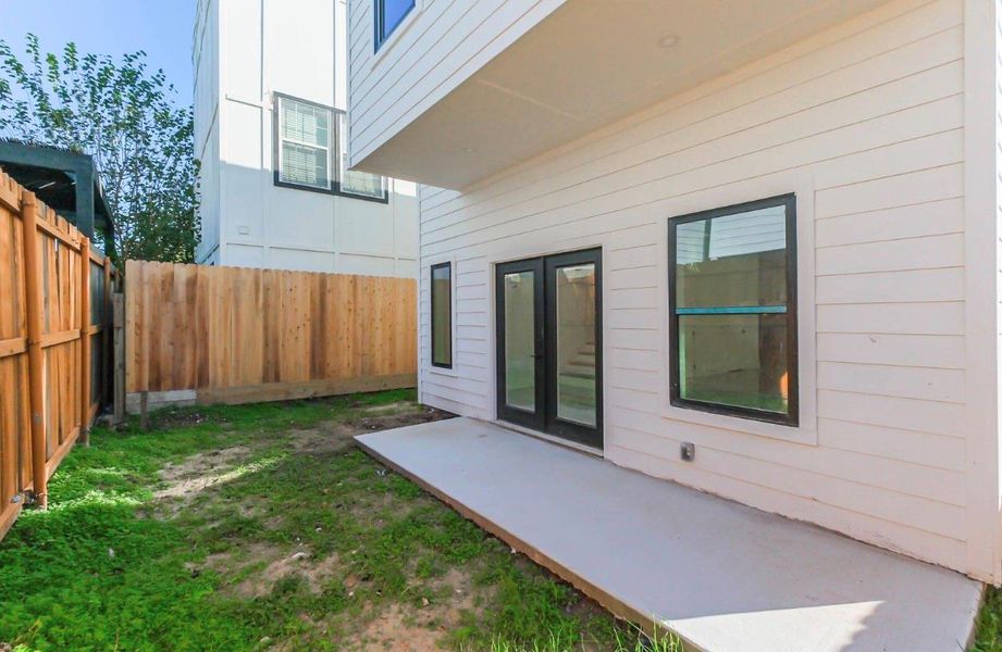 Exterior details and patio area of a home in , Houston (Image 3). Exterior details and patio area of a home in , Houston (Image 3).