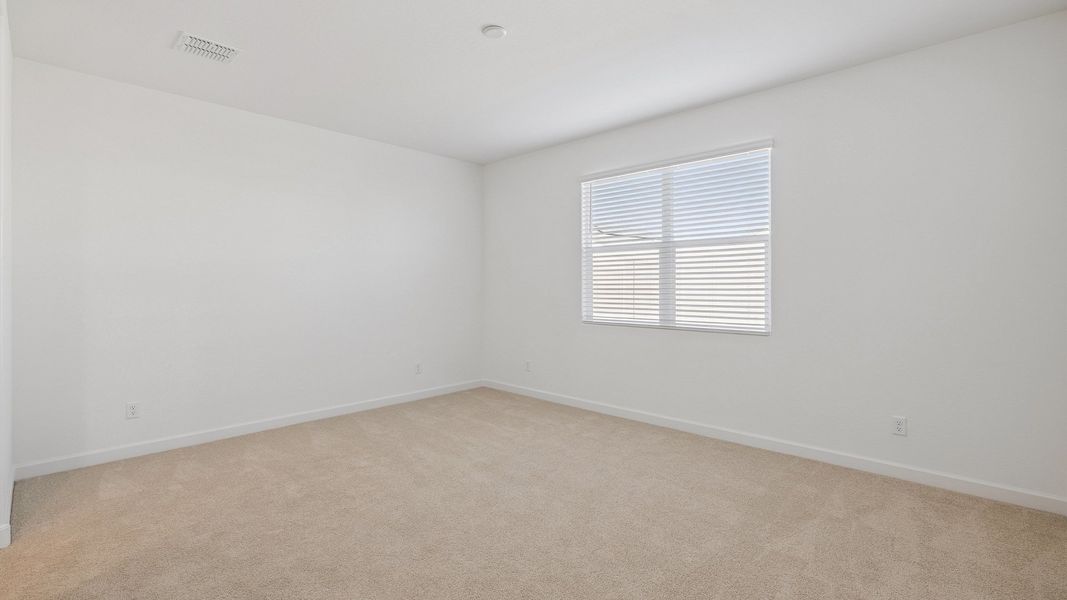 Spacious, unfurnished interior of a new home in Desert Moon Estates, Buckeye (Image 14).