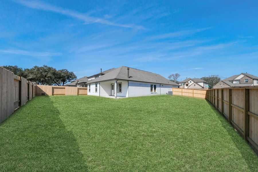 Backyard retreat, offering an abundance of space for kids to play and explore. The possibilities are endless in this outdoor haven, where the joy of open-air activities and family gatherings awaits. Backyard retreat, offering an abundance of space for kids to play and explore. The possibilities are endless in this outdoor haven, where the joy of open-air activities and family gatherings awaits.