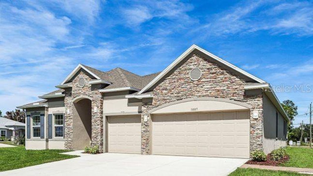 Front exterior of a new home in Deep Creek, Punta Gorda, FL, highlighting curb appeal (Image 2). Front exterior of a new home in Deep Creek, Punta Gorda, FL, highlighting curb appeal (Image 2).