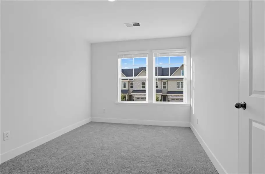 Spacious, unfurnished interior of a new home in Towns at Holly Springs, Holly Springs (Image 27).