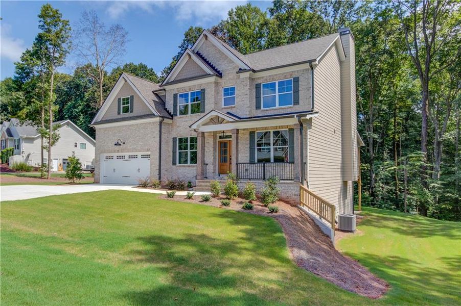 Front exterior of a new home in , Pendergrass, GA, highlighting curb appeal (Image 20). Front exterior of a new home in , Pendergrass, GA, highlighting curb appeal (Image 20).
