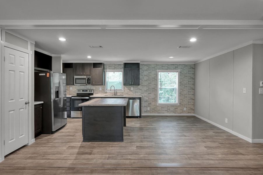 Furnished interior view inside a new home in , New Waverly (Image 4).