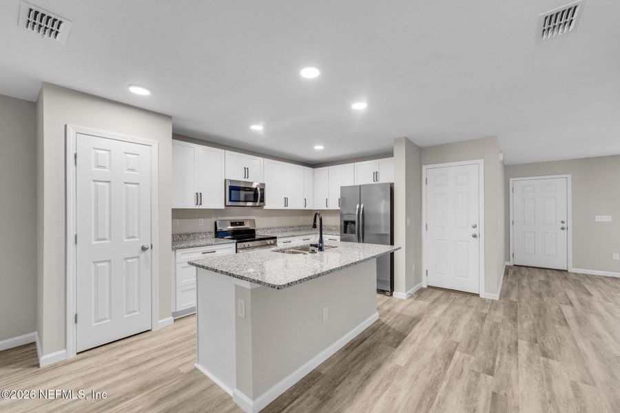 Furnished interior view inside a new home in , Jacksonville (Image 9).