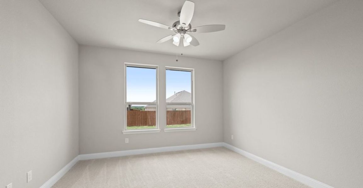 Representative exterior photo of a completed home built from the Donnington by Impression Homes in Still Water Lake, Godley, TX (Image 13).