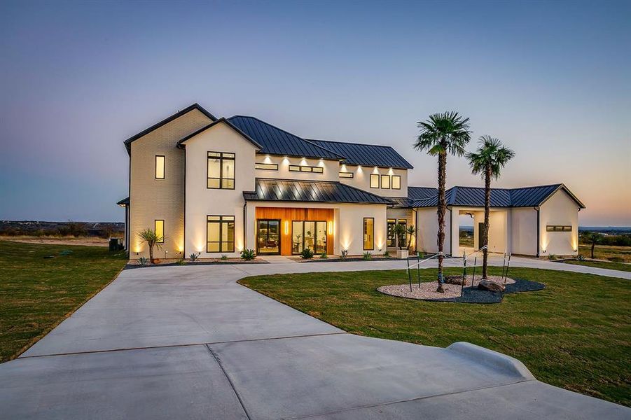 Front exterior of a new home in , Weatherford, TX, highlighting curb appeal (Image 2).