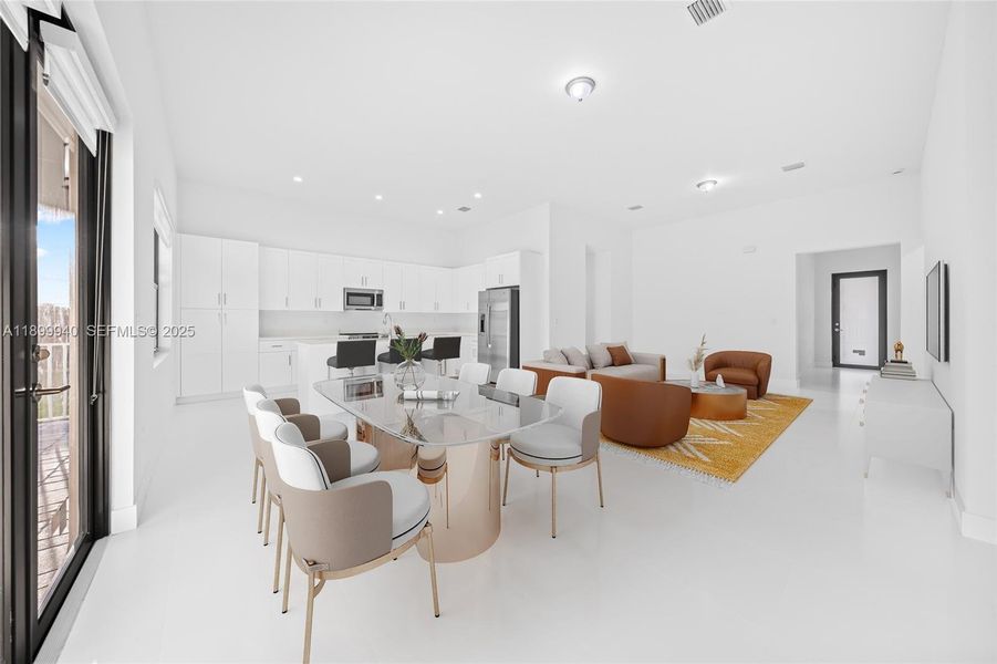 Great Room virtually staged (view of dining, living, kitchen, foyer)