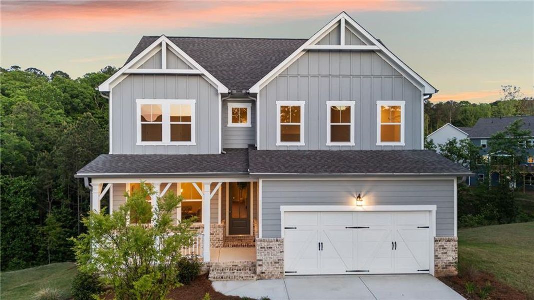 Front exterior of a new home in Riverwood, Dallas, GA, highlighting curb appeal (Image 32). Front exterior of a new home in Riverwood, Dallas, GA, highlighting curb appeal (Image 32).