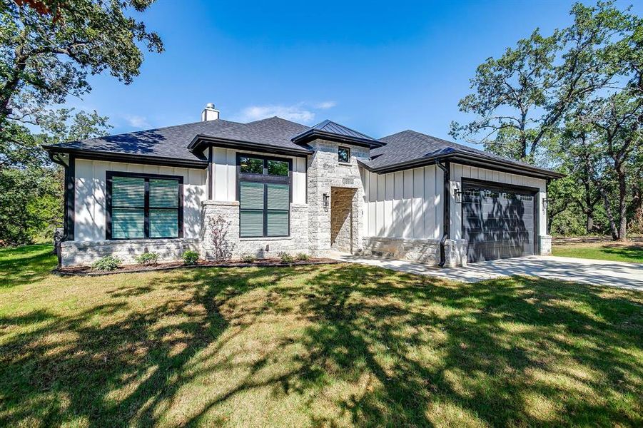 Front exterior of a new home in , Bridgeport, TX, highlighting curb appeal (Image 24).