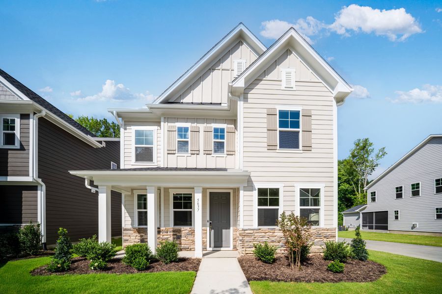 Front exterior of a new home in Cayden Cove, Wendell, NC, highlighting curb appeal (Image 1). Front exterior of a new home in Cayden Cove, Wendell, NC, highlighting curb appeal (Image 1).