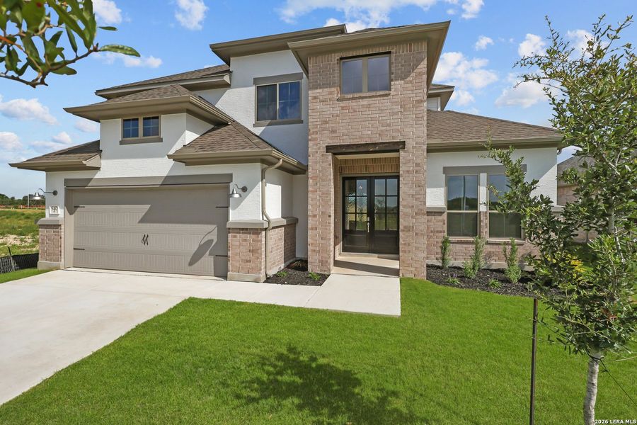 Front exterior of a new home in Buffalo Crossing, Cibolo, TX, highlighting curb appeal (Image 27).