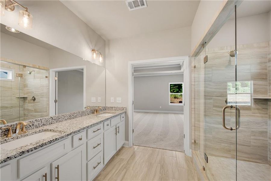 Furnished interior view inside a new home in Hidden Fields, Hoschton (Image 13).