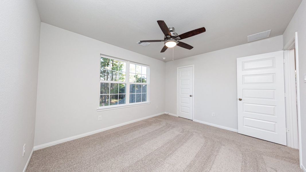 Representative unfurnished interior of a home built from the The Bronte - Walden on Lake Conroe by Legend Homes in Lake Conroe Area Homes, Montgomery (Image 15).