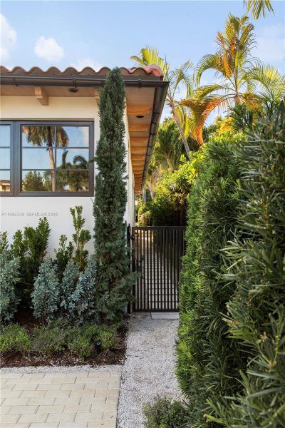 Exterior details and patio area of a home in , Miami Beach (Image 28). Exterior details and patio area of a home in , Miami Beach (Image 28).