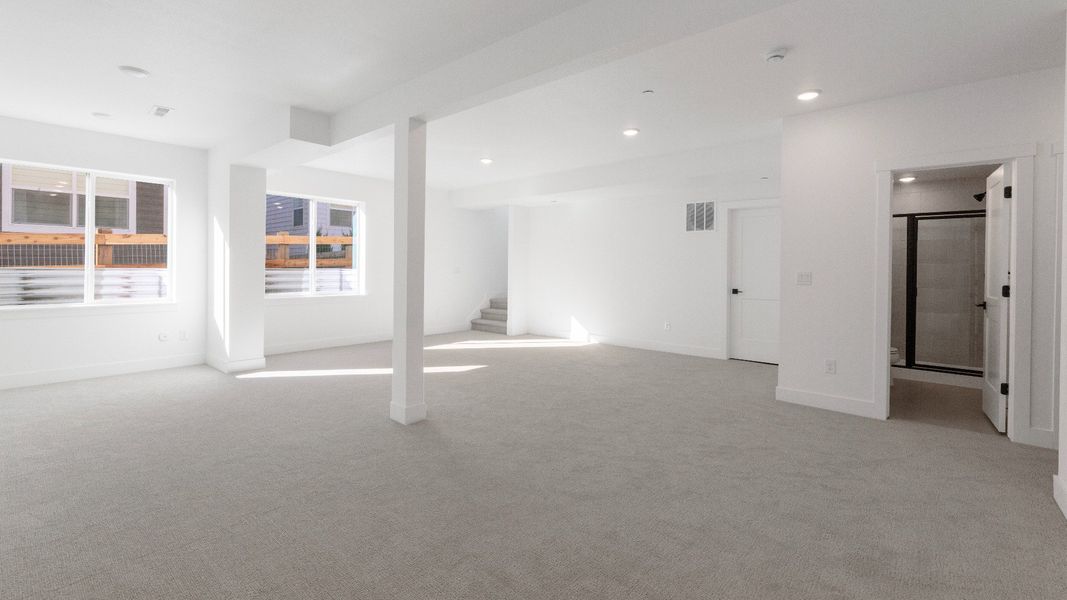 Furnished interior view inside a new home in Dillon Pointe - Journey, Broomfield (Image 30).