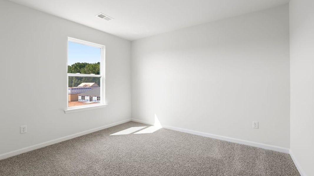 Spacious, unfurnished interior of a new home in Bentley Park, Greenwood (Image 28).