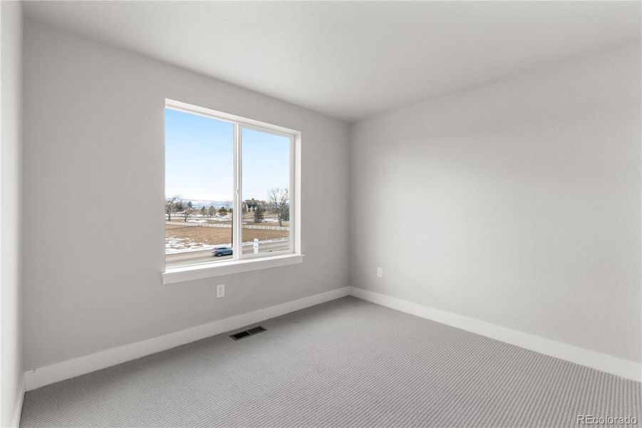 Spacious, unfurnished interior of a new home in Dillon Pointe - Skyview, Broomfield (Image 12).