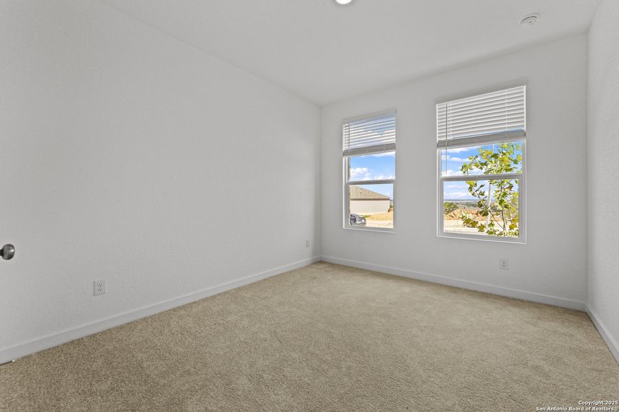 Spacious, unfurnished interior of a new home in Waterwheel: Coastline Collection, San Antonio (Image 12).