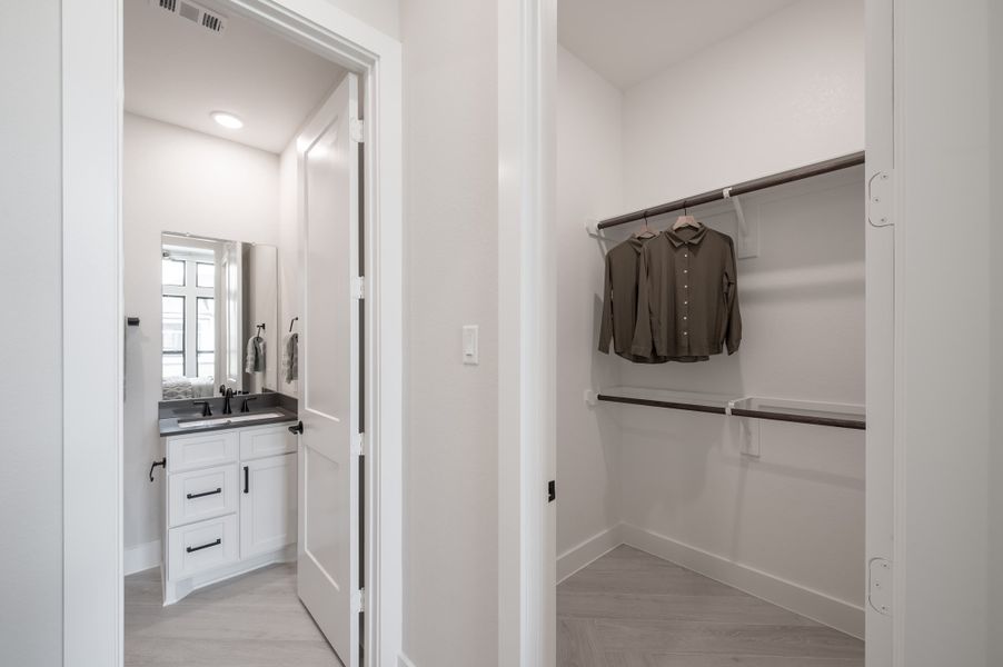 Representative furnished interior of a home built from the Carignan by Tri Pointe Homes in Sienna 80′, Missouri City (Image 45).