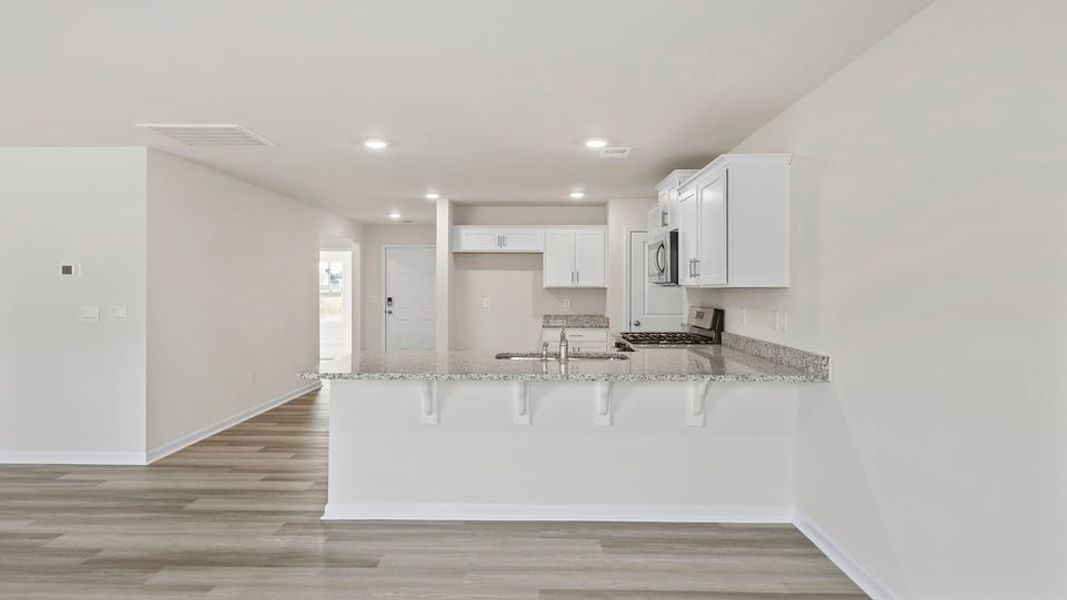 Furnished interior view inside a new home in Lakestone, Woodruff (Image 11).
