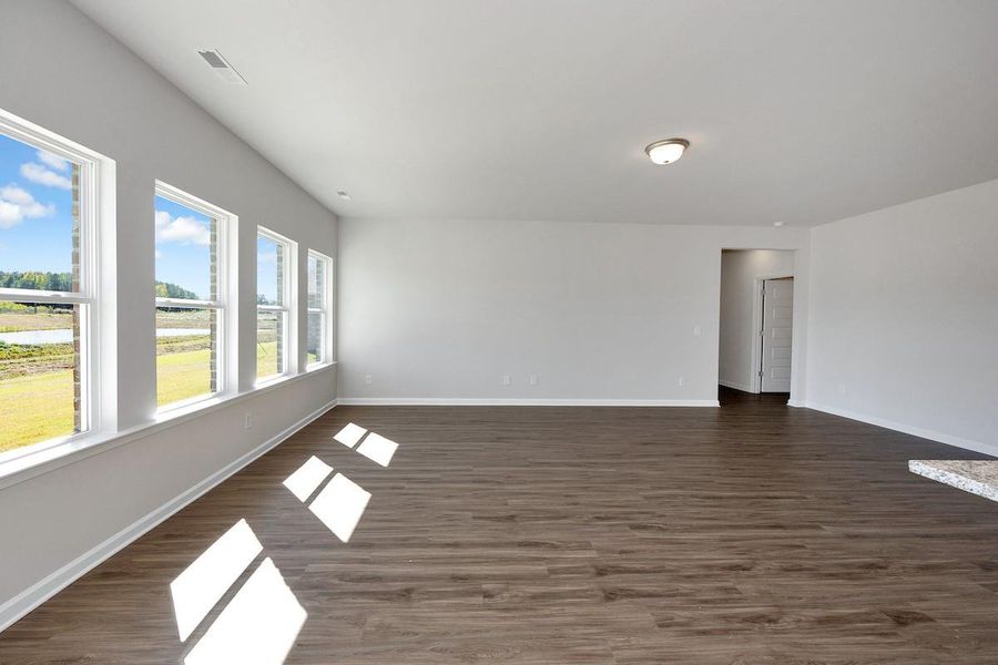 The Avery- Dining Area into Family Room. Sample image for illustration; upgrades, options, and colors may vary. The Avery- Dining Area into Family Room. Sample image for illustration; upgrades, options, and colors may vary.